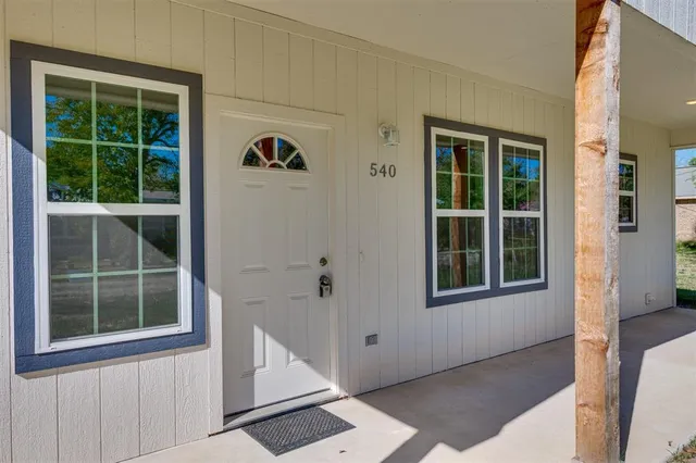 a view of an entryway of a house