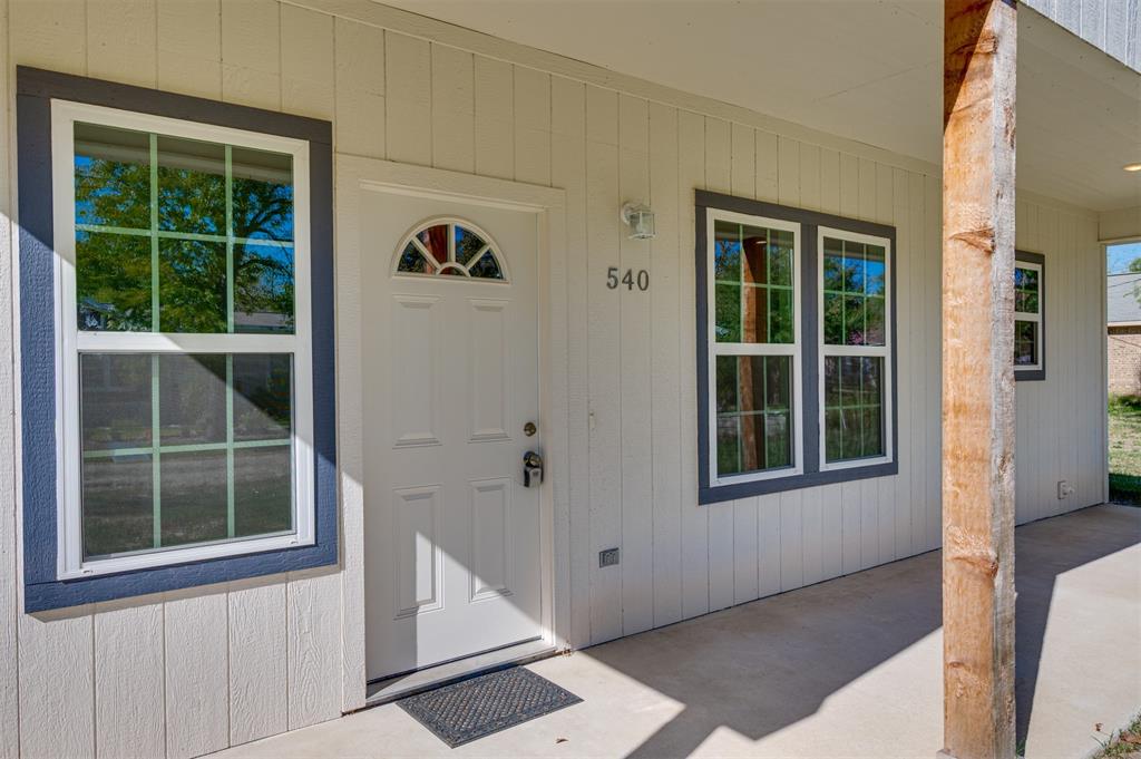 540 Southeast 2nd Street Cooper, TX 75432 - Photo 6 of 30 a view of an entryway of a house