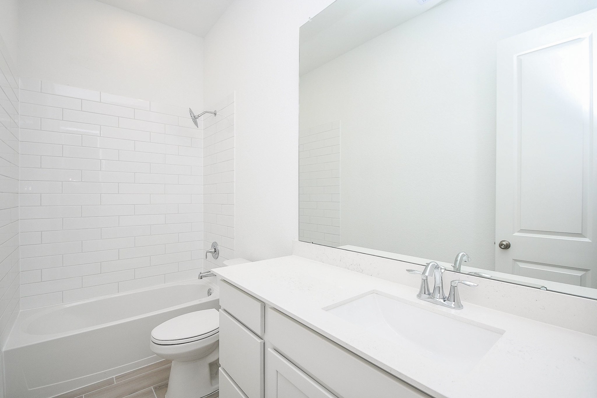 4227 Eagle Pass Drive Rosenberg, TX 77469 - Photo 22 of 28 a bathroom with a sink toilet vanity and bathtub