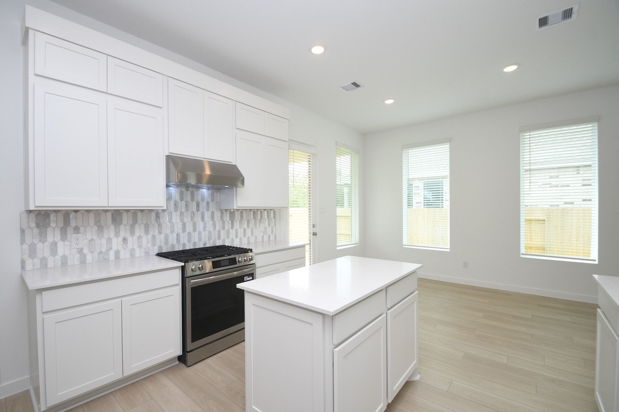 4227 Eagle Pass Drive Rosenberg, TX 77469 - Photo 7 of 28 Notice the abundance of natural light entering this well designed kitchen.