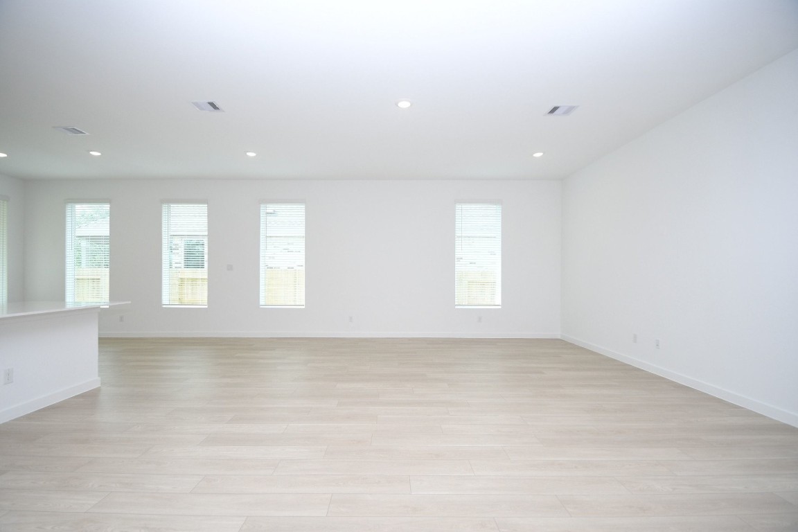 4227 Eagle Pass Drive Rosenberg, TX 77469 - Photo 8 of 28 Spacious living room open to dining and kitchen.