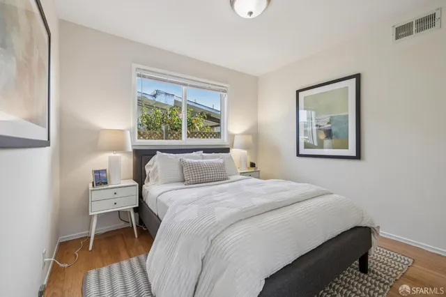 a bathroom with a sink a mirror a shower and vanity