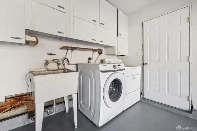 a view of a patio with a table and chairs and potted plants
