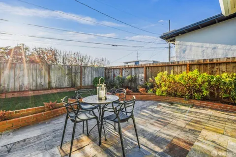 a view of garden with patio