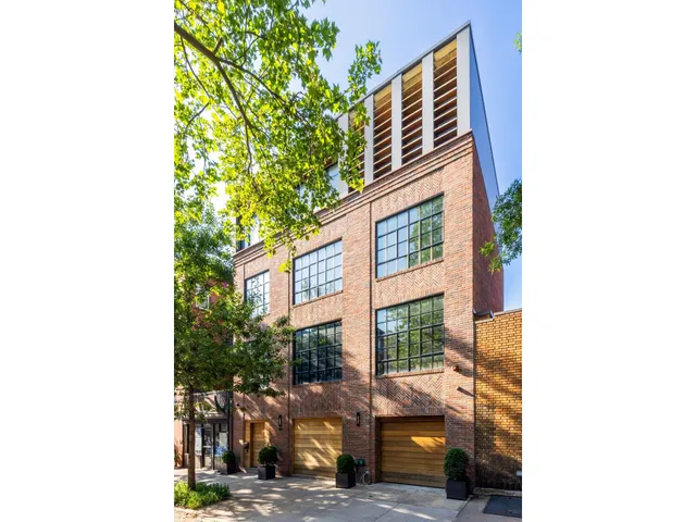 a front view of a building with street view