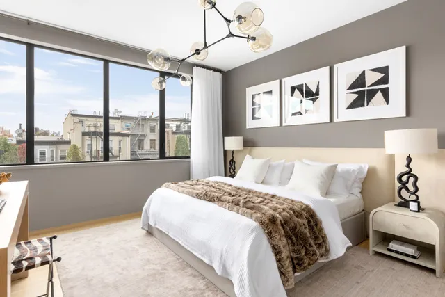 a view of a city with tall buildings