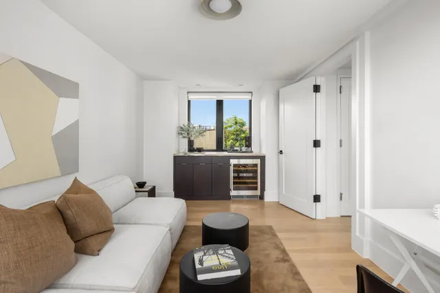 a spacious bathroom with a bathtub and window