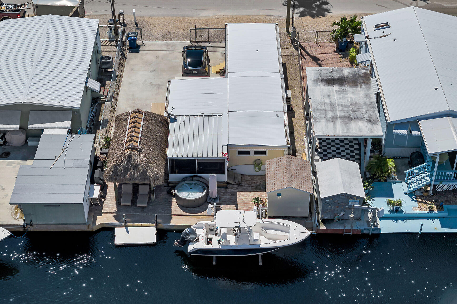 209 Buttonwood Avenue Key Largo, FL 33037 - Photo 1 of 46 a dining room with furniture and chandelier