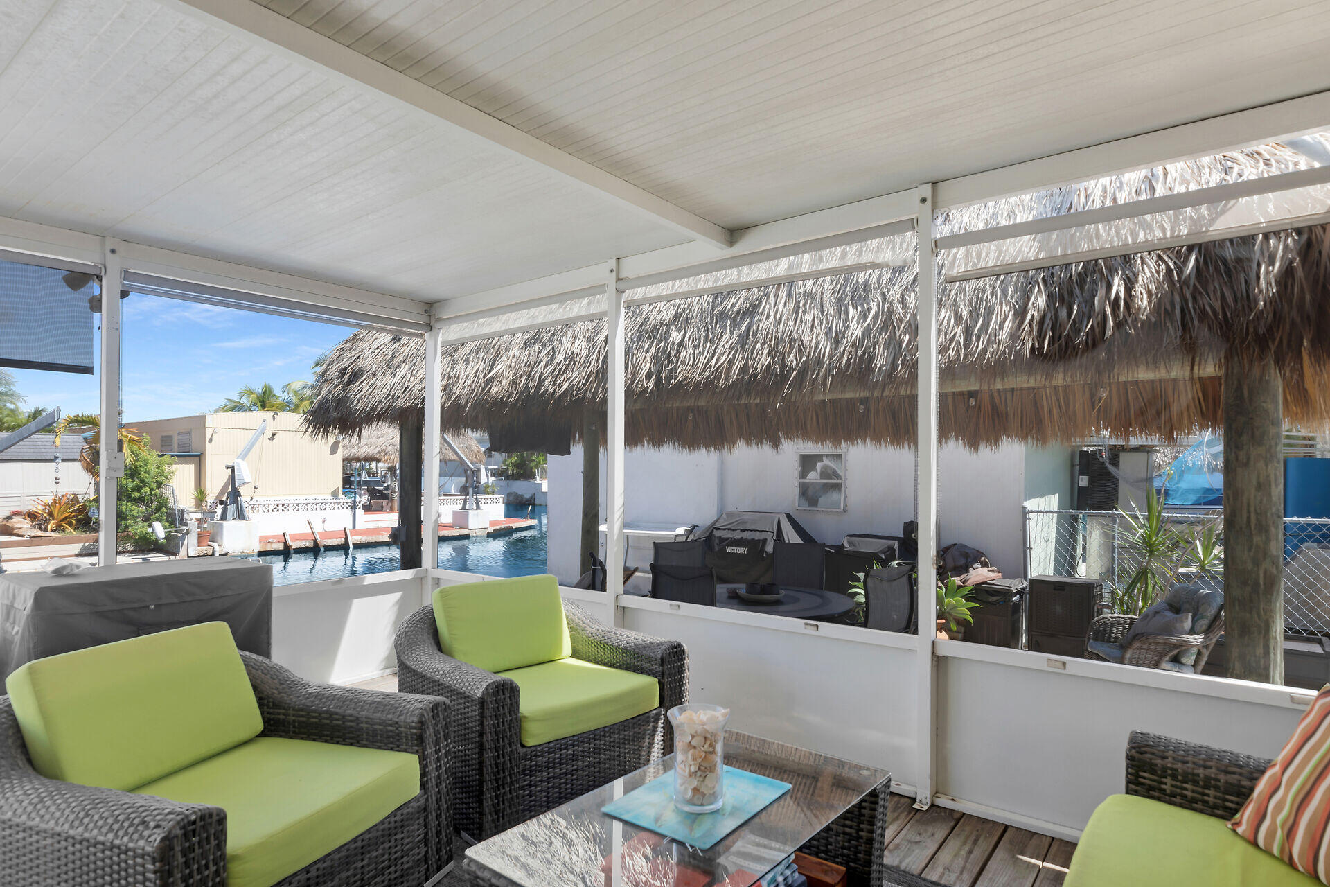 209 Buttonwood Avenue Key Largo, FL 33037 - Photo 13 of 46 a living room with furniture and a large window