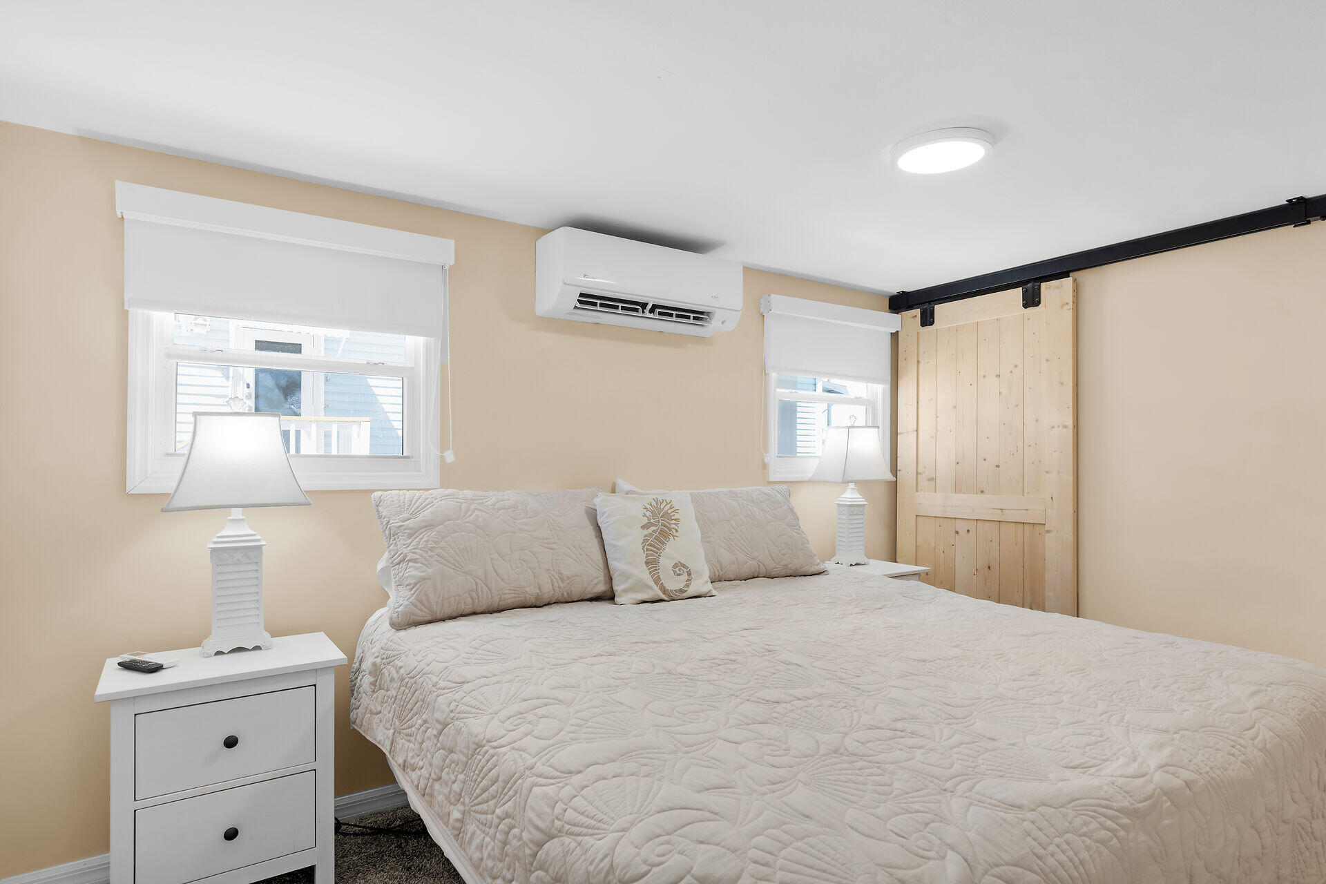 209 Buttonwood Avenue Key Largo, FL 33037 - Photo 22 of 46 a bedroom with a bed and a night stand