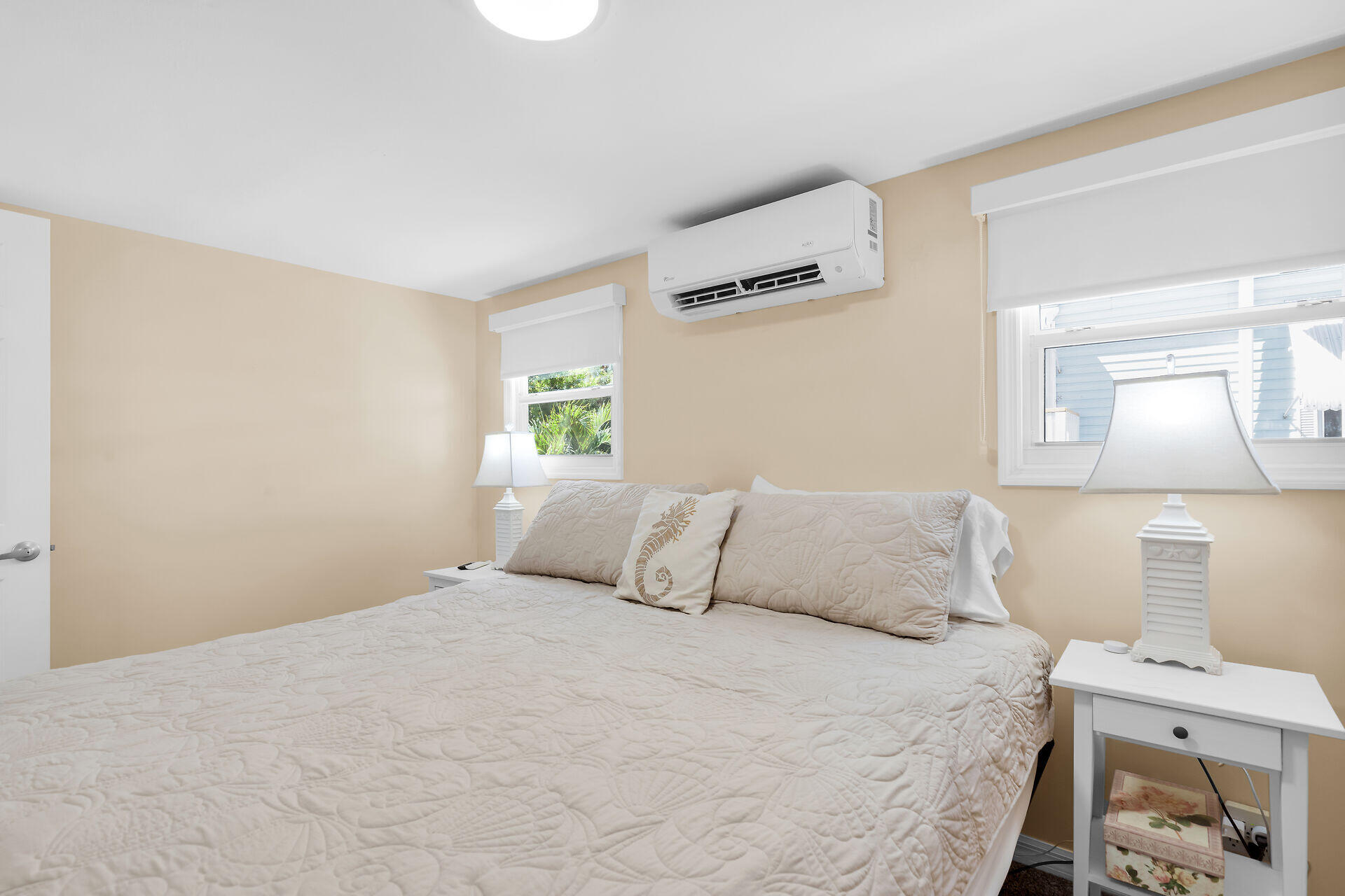 209 Buttonwood Avenue Key Largo, FL 33037 - Photo 24 of 46 a bedroom with a bed and a window