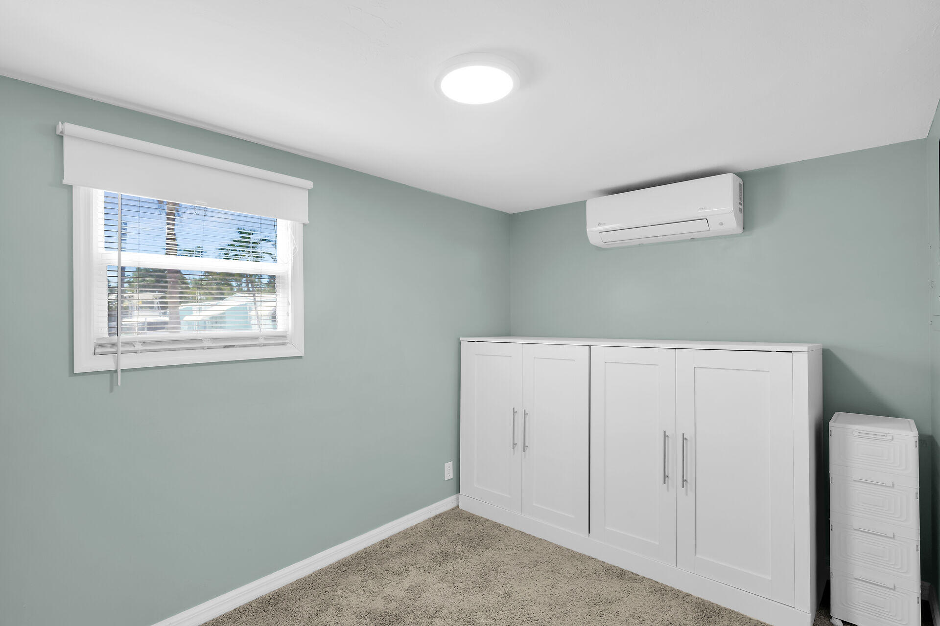 209 Buttonwood Avenue Key Largo, FL 33037 - Photo 26 of 46 a view of an empty room with a window