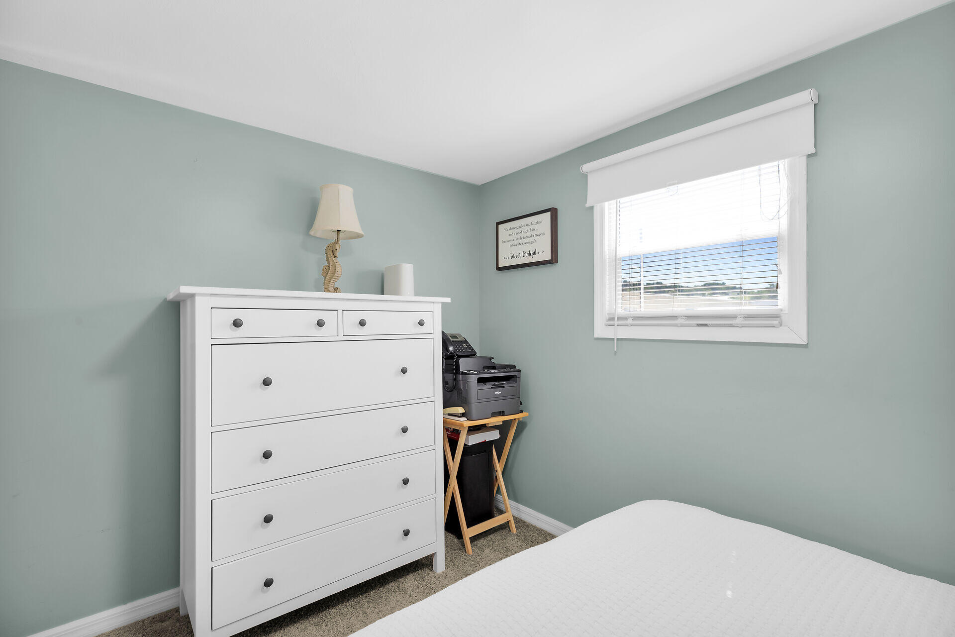 209 Buttonwood Avenue Key Largo, FL 33037 - Photo 31 of 46 a bedroom with a bed and a window