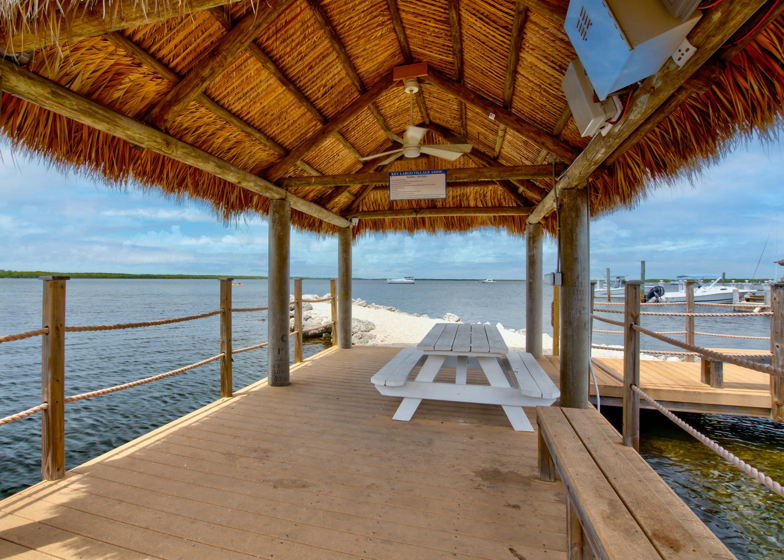 209 Buttonwood Avenue Key Largo, FL 33037 - Photo 39 of 46 a view of a room with wooden floor