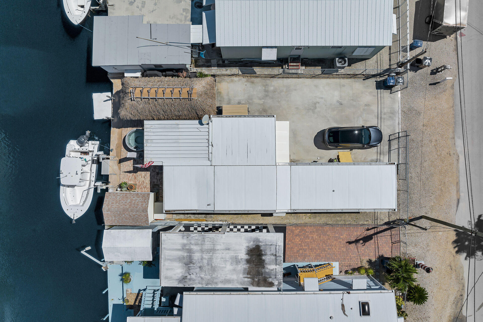 209 Buttonwood Avenue Key Largo, FL 33037 - Photo 46 of 46 an aerial view of residential houses with outdoor space