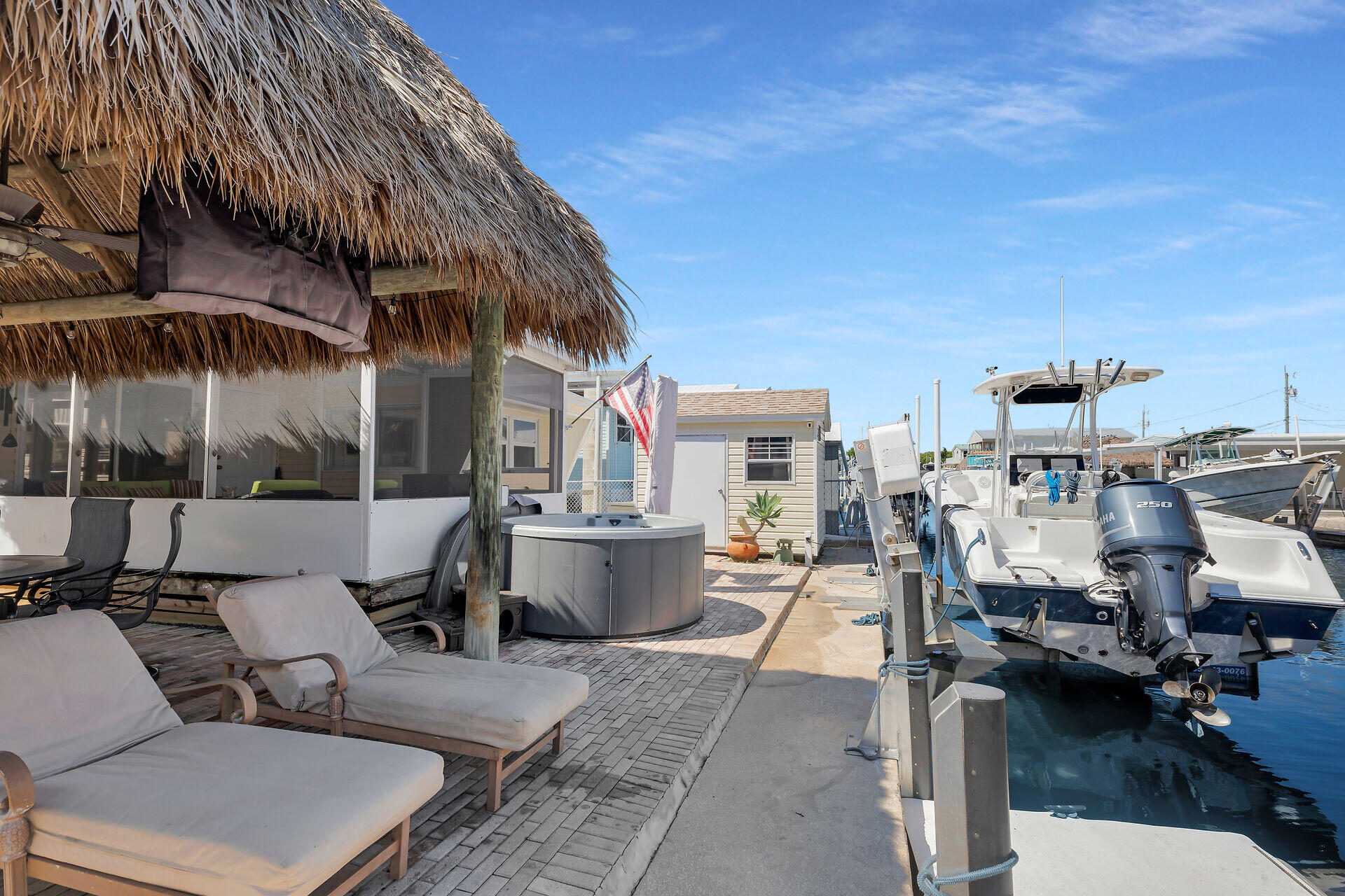 209 Buttonwood Avenue Key Largo, FL 33037 - Photo 5 of 46 a building outdoor space with patio furniture