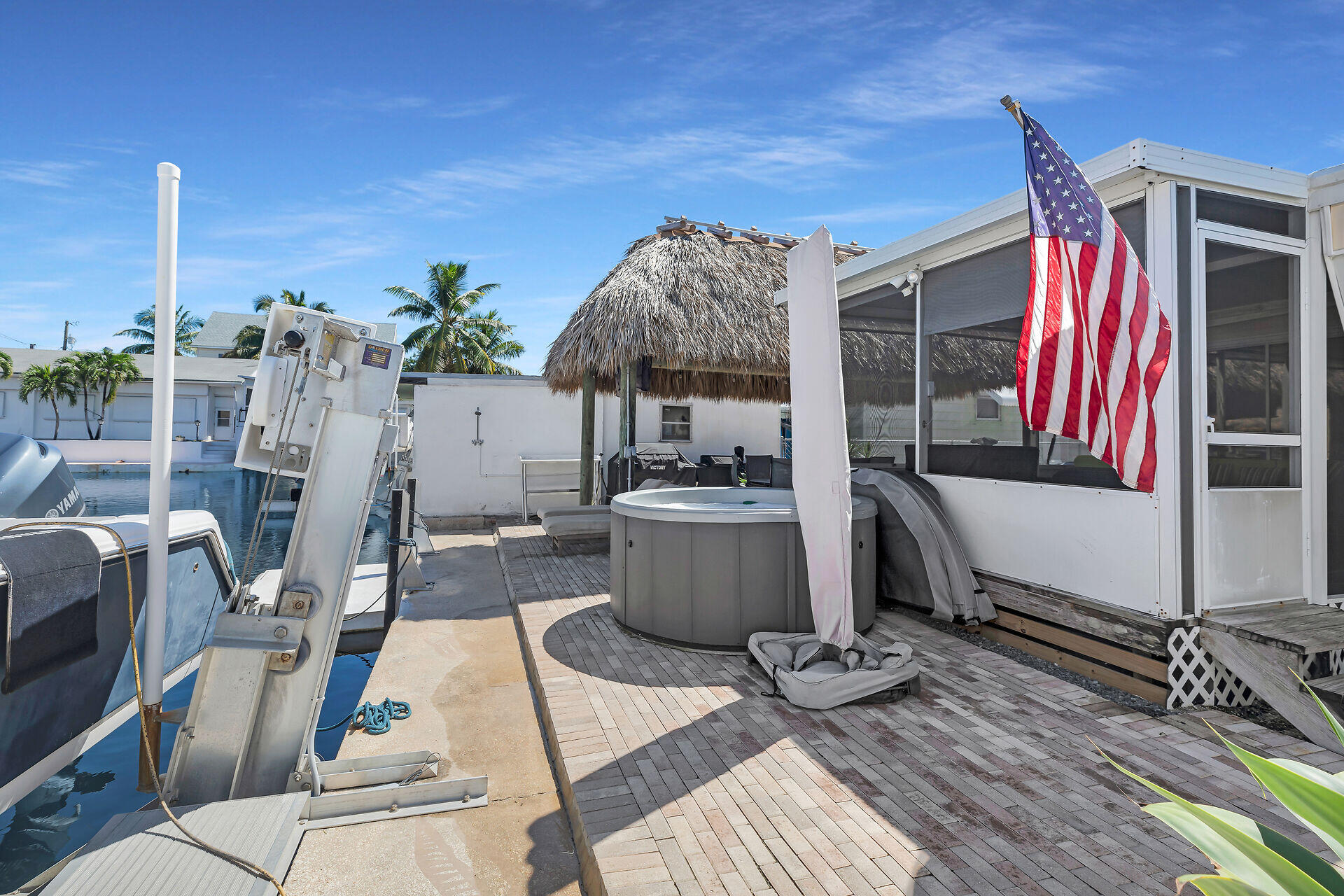 209 Buttonwood Avenue Key Largo, FL 33037 - Photo 6 of 46 a building outdoor space with patio furniture