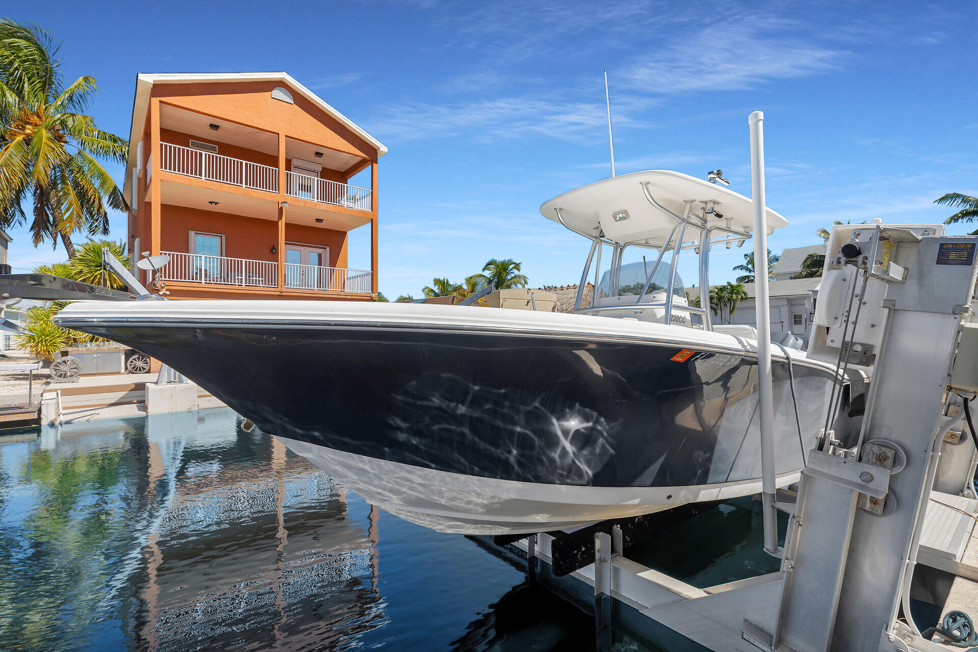 209 Buttonwood Avenue Key Largo, FL 33037 - Photo 7 of 46 a table and chairs in a balcony