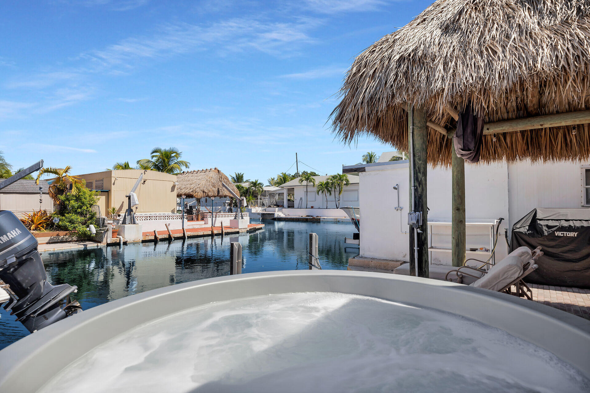 209 Buttonwood Avenue Key Largo, FL 33037 - Photo 8 of 46 a view of a house with backyard and sitting area