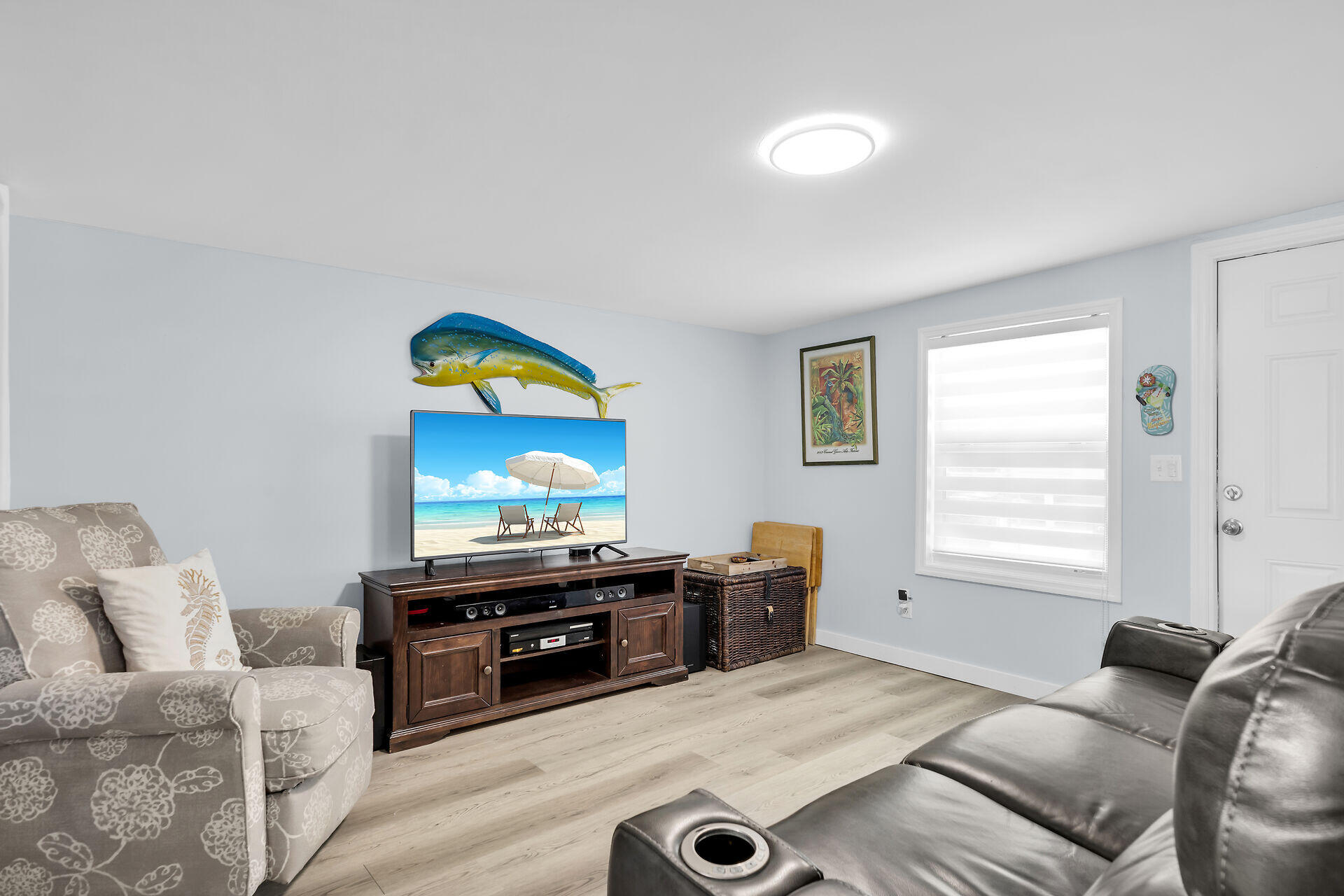 209 Buttonwood Avenue Key Largo, FL 33037 - Photo 9 of 46 a living room with furniture and a flat screen tv