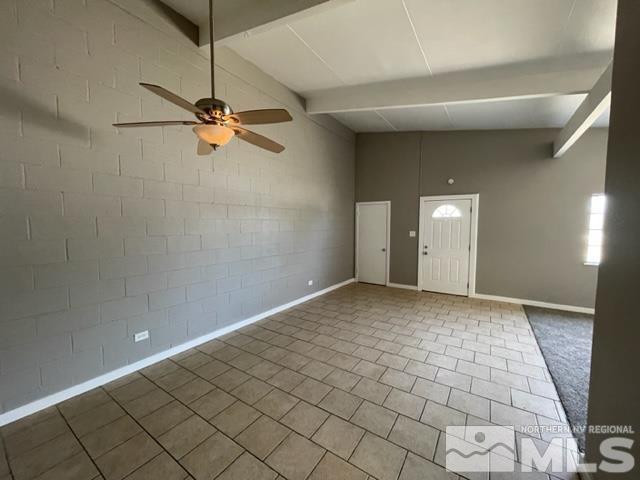 12192 Andes Street Reno, NV 89506 - Photo 3 of 17 an empty room with windows and fan
