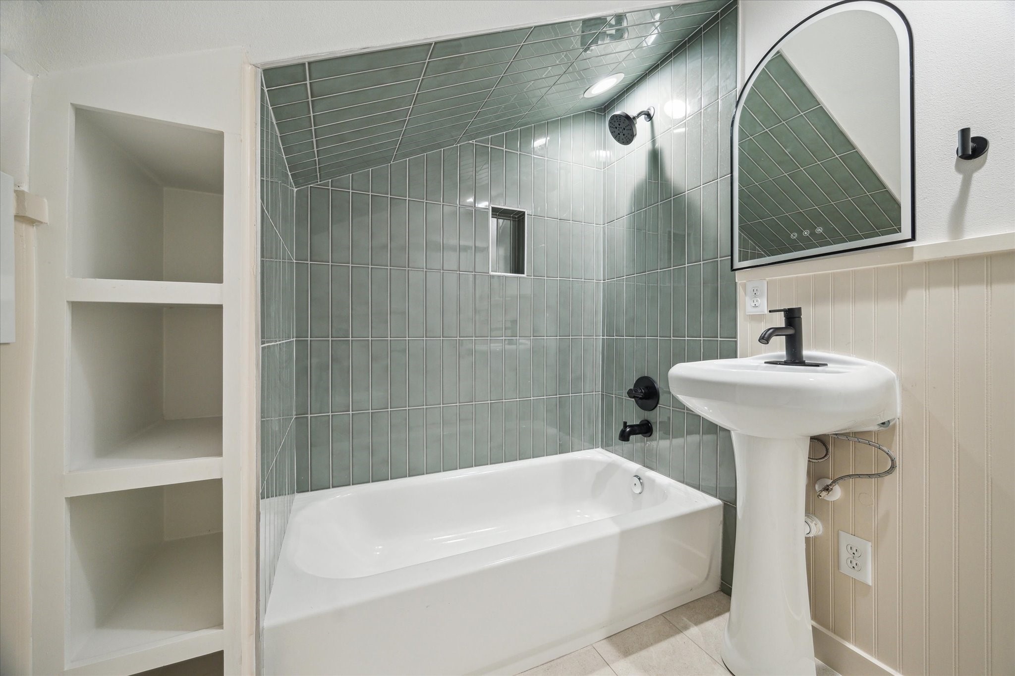 3902 Zina Way Houston, TX 77018 - Photo 18 of 48 a white bath tub sitting next to a white sink
