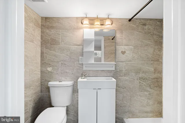 a view of a backyard and a fence