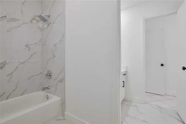 a bathroom with a bathtub