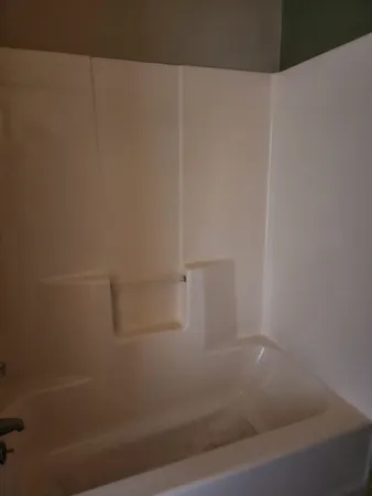 a bathroom with a bathtub