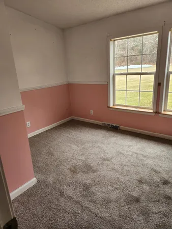 an empty room with a window