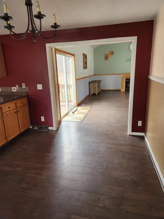 a view of a livingroom with furniture and window