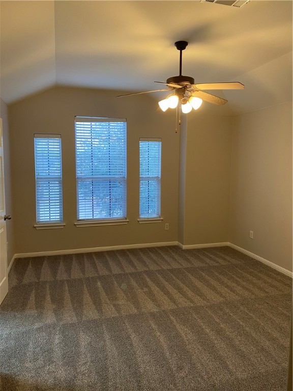 2700 Saddle Blanket Place Leander, TX 78641 - Photo 13 of 23 a view of an empty room with window and chandelier fan
