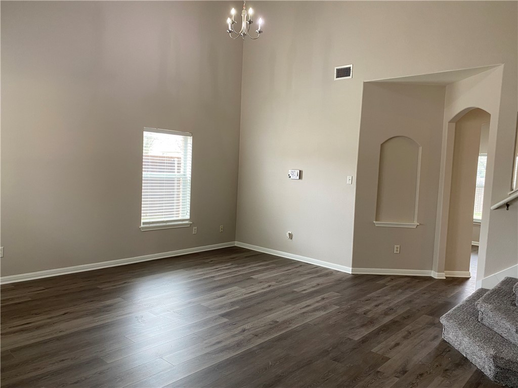 2700 Saddle Blanket Place Leander, TX 78641 - Photo 5 of 23 a view of a livingroom with wooden floor and window
