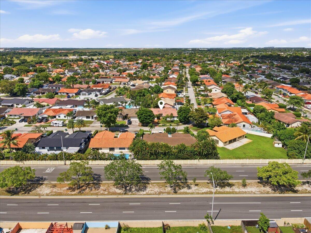 20009 Northwest 66th Place Hialeah, FL 33015 - Photo 32 of 33 an aerial view of residential houses with outdoor space