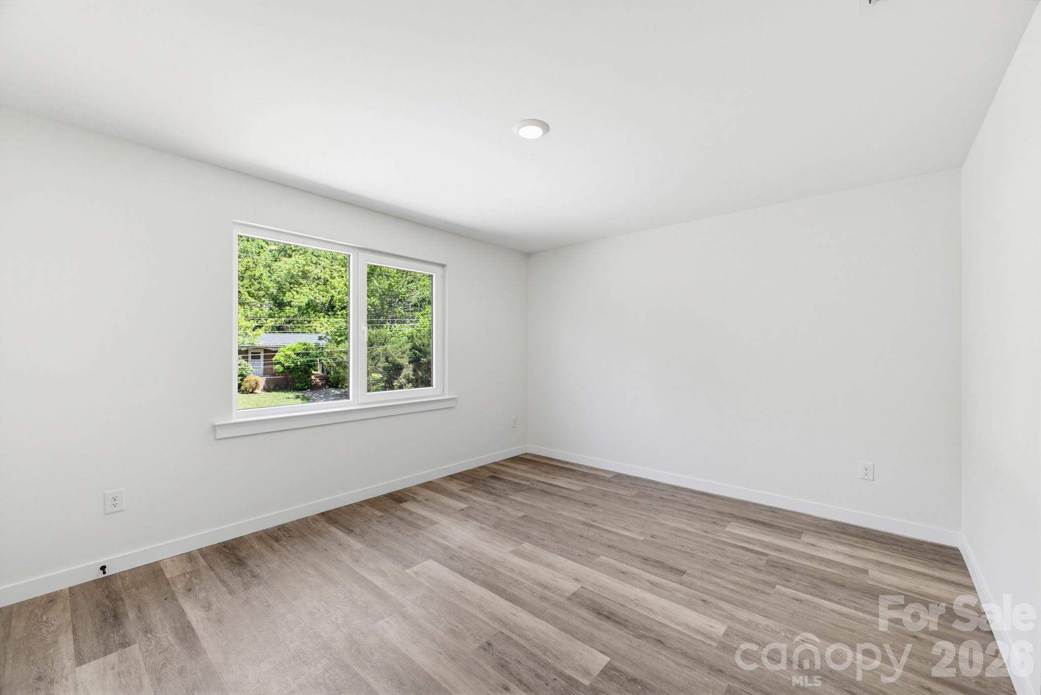 701 2nd St Place Southwest Conover, NC 28613 - Photo 12 of 16 an empty room with a window