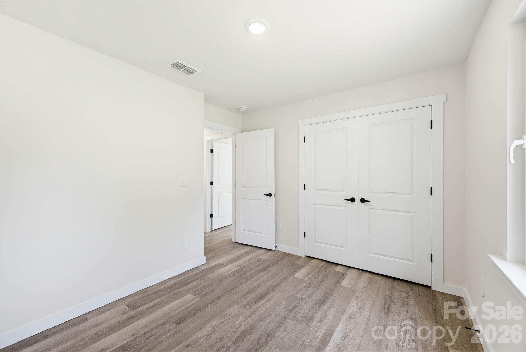 701 2nd St Place Southwest Conover, NC 28613 - Photo 16 of 16 a view of a room with wooden floor