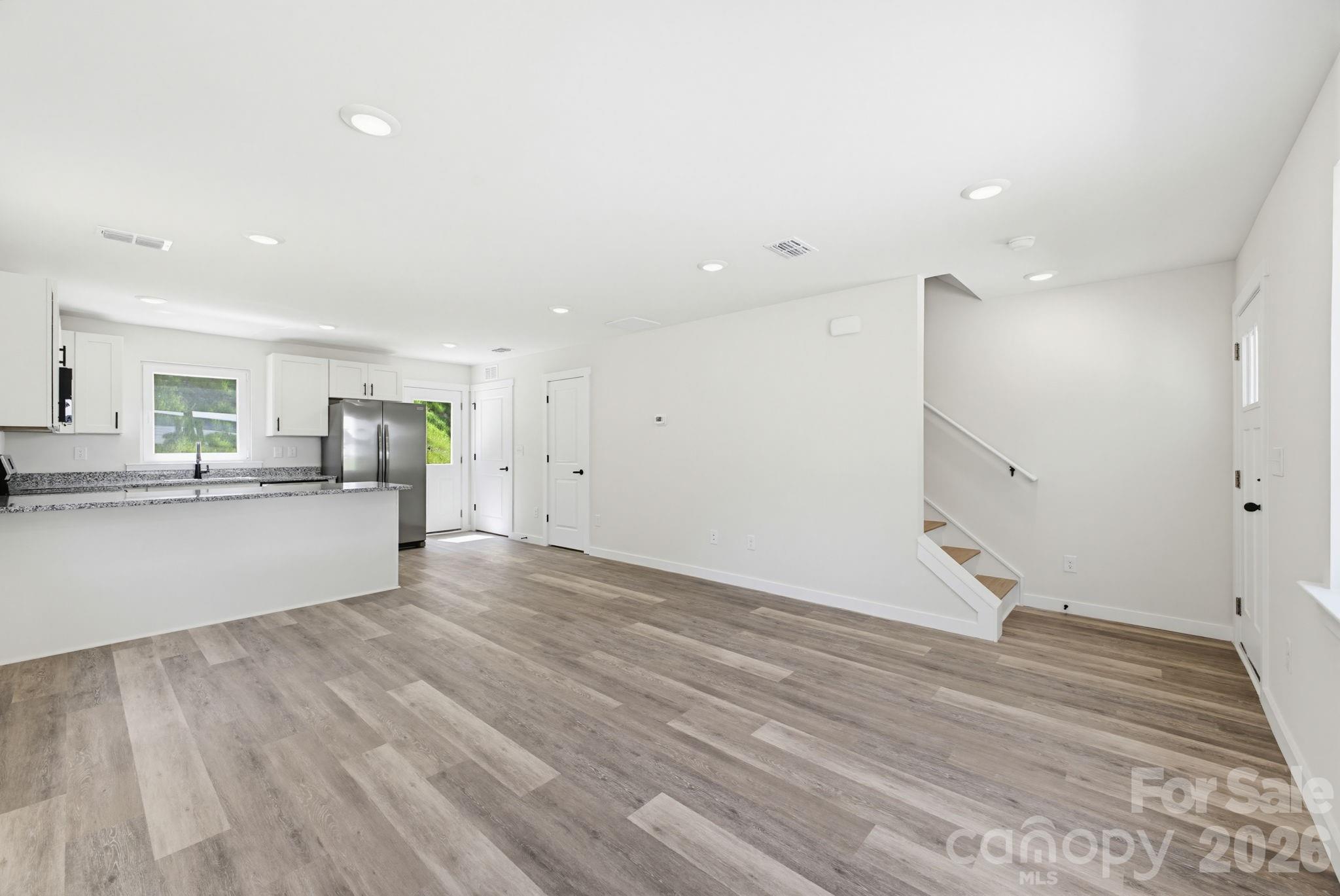 701 2nd St Place Southwest Conover, NC 28613 - Photo 6 of 16 a view of kitchen with wooden floor