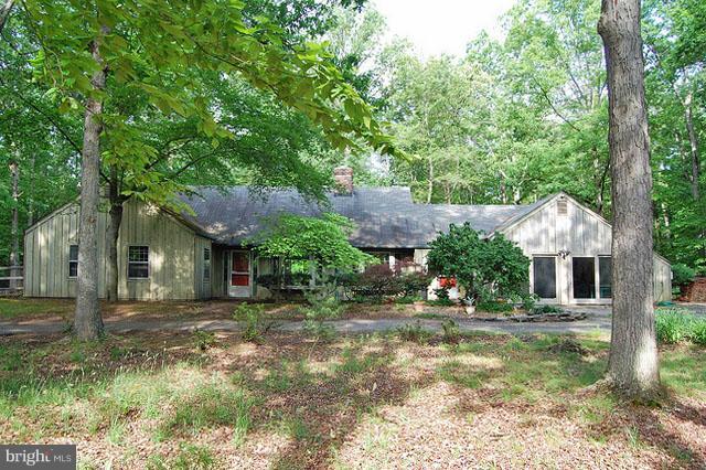 15305 Reserve Road Accokeek, MD 20607 - Photo 1 of 1 a front view of a house with garden