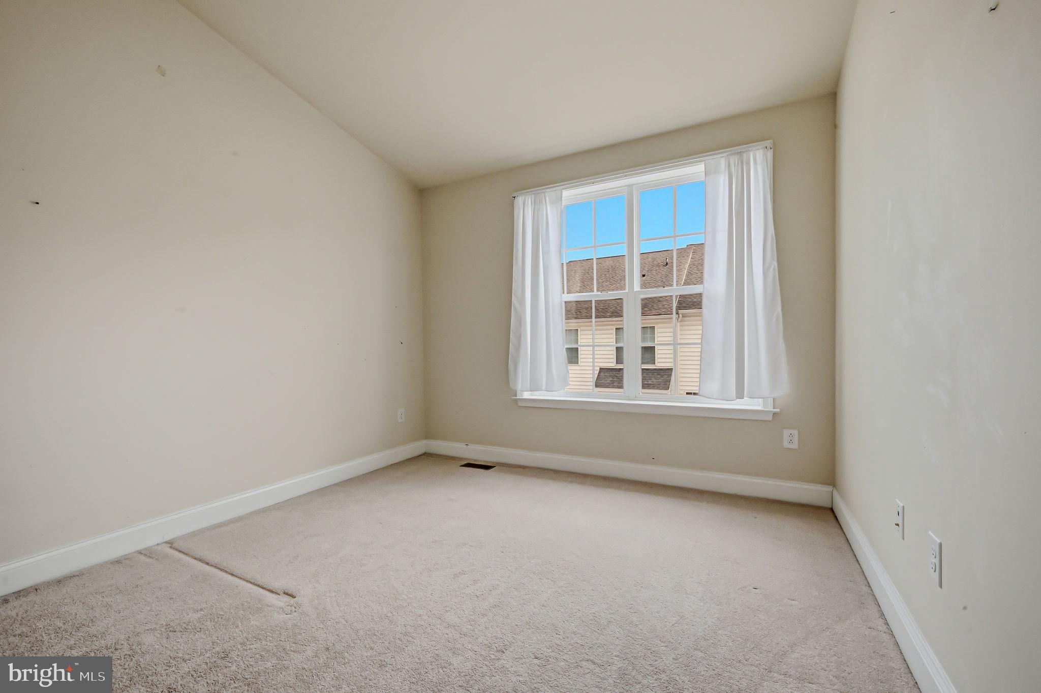 208 Jackdaw Alley, Unit 208 Springfield, PA 19064 - Photo 34 of 49 an empty room with a window