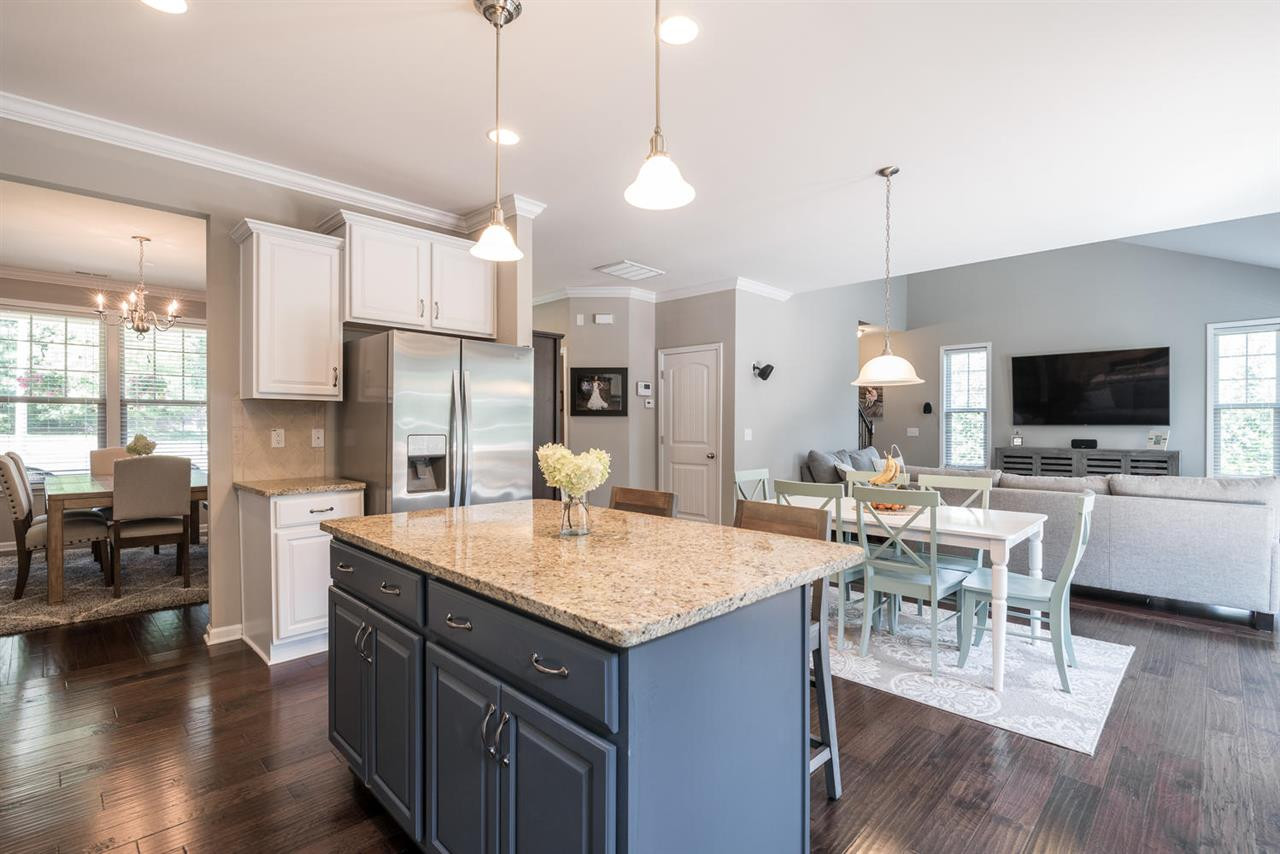 107 Holyoke Court Raleigh, NC 27603 - Photo 8 of 25 Functional, roomy space and a great flow makes this house live larger than the listed square footage. Kitchen/Family/Dining