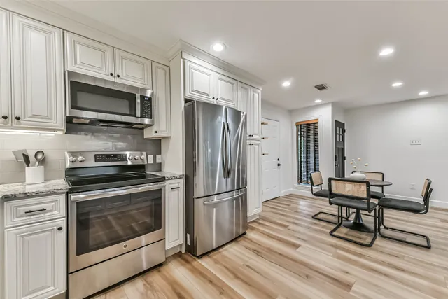 a workspace with furniture and a window