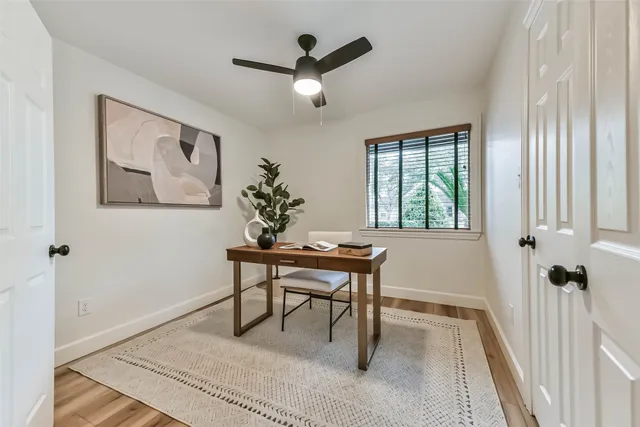 a view of a workspace with furniture
