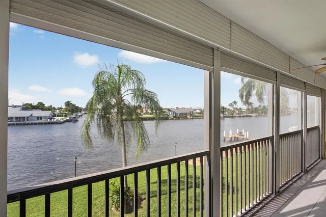 a view of a lake from a balcony
