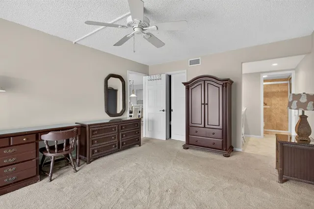 a view of a fountain in front of a house