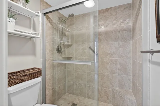 a dining room with furniture window and outside view