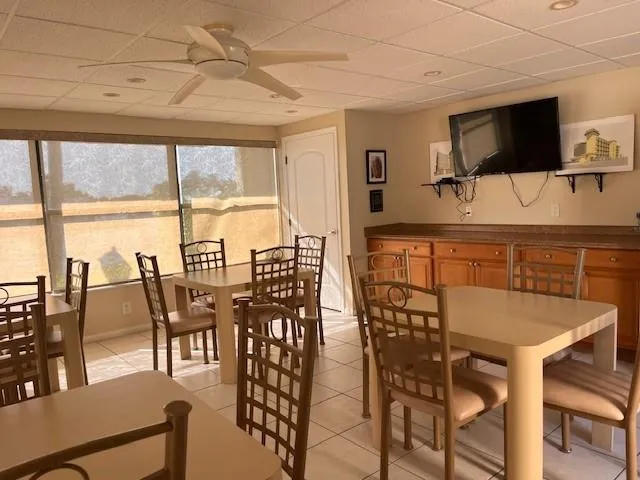 a view of a lake with outdoor seating