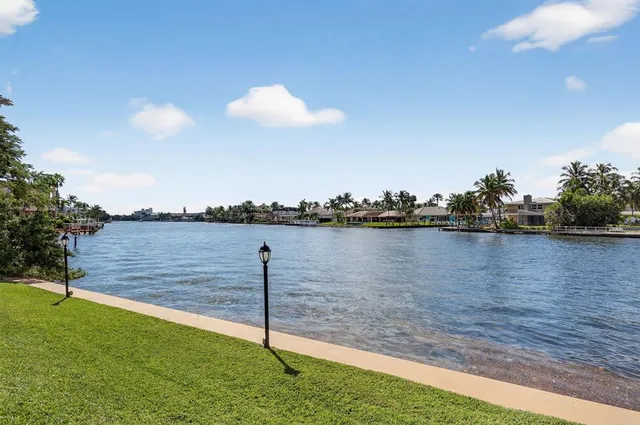 a view of a lake with a swimming pool