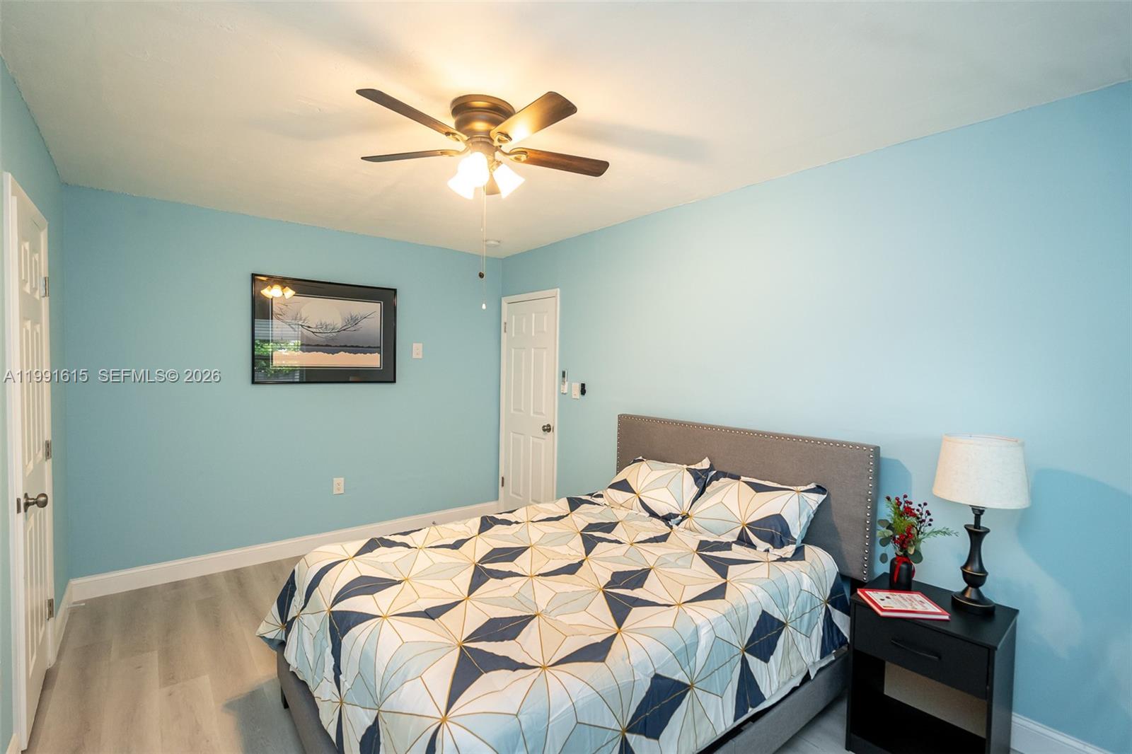 2230 Southwest 60th Court Miami, FL 33155 - Photo 19 of 35 a bedroom with bed and a window