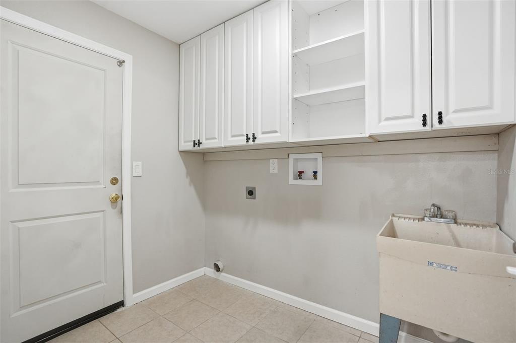 7026 Whitethorn Court Port Richey, FL 34668 - Photo 37 of 45 a view of cabinets