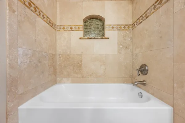 a bathroom with a bathtub